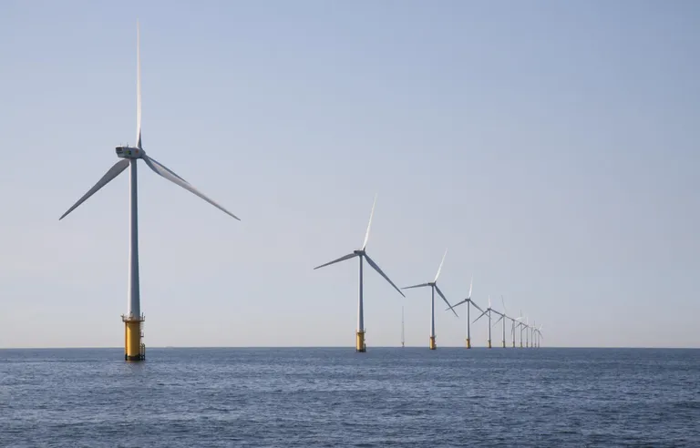 Offshore Development Center Australia concept with offshore wind turbines in ocean representing sustainable infrastructure