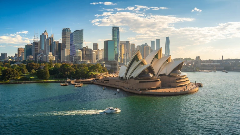 Offshore Development Center Australia concept illustrated with Sydney skyline and Opera House waterfront view